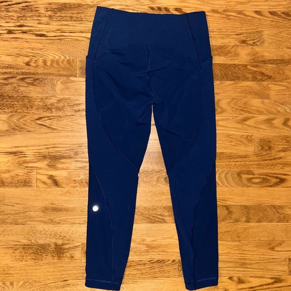 Lululemon navy leggings w/ laser cut design down sides - Picture 5 of 10